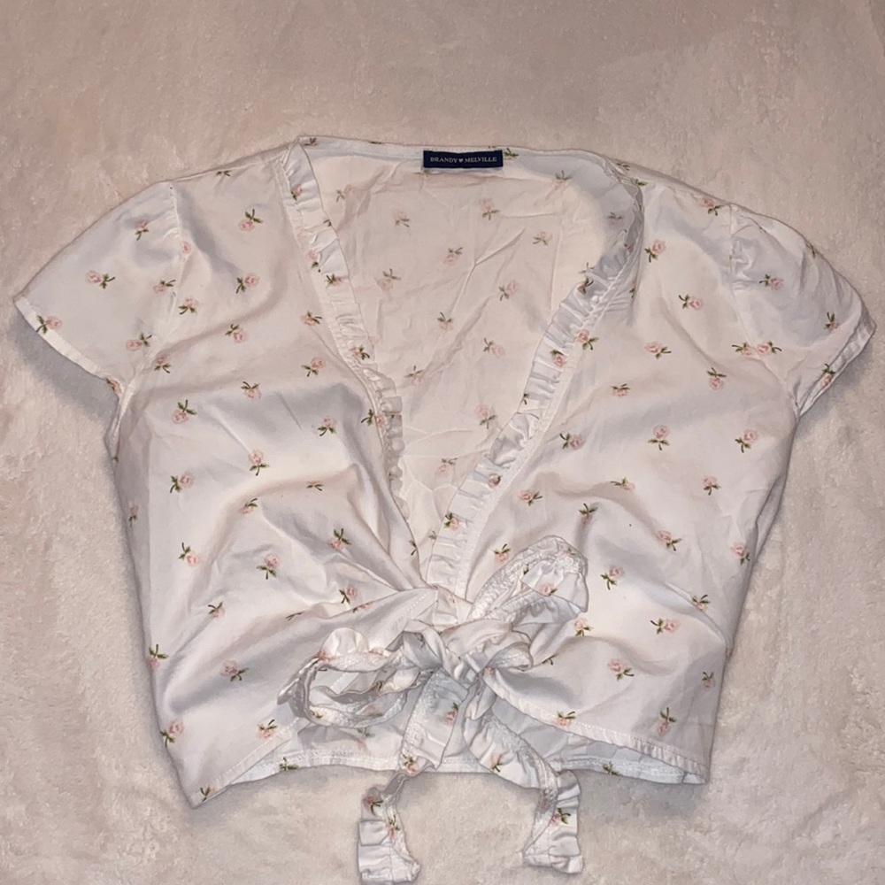 Brandy Melville white tie top with pink flowers and ruffle detail!!🌸